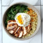 Chicken breakfast bowl with egg and veggies