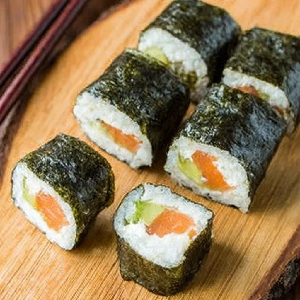 Homemade Sushi Ready to Serve1 Homemade sushi rolls served with soy sauce, wasabi, and ginger